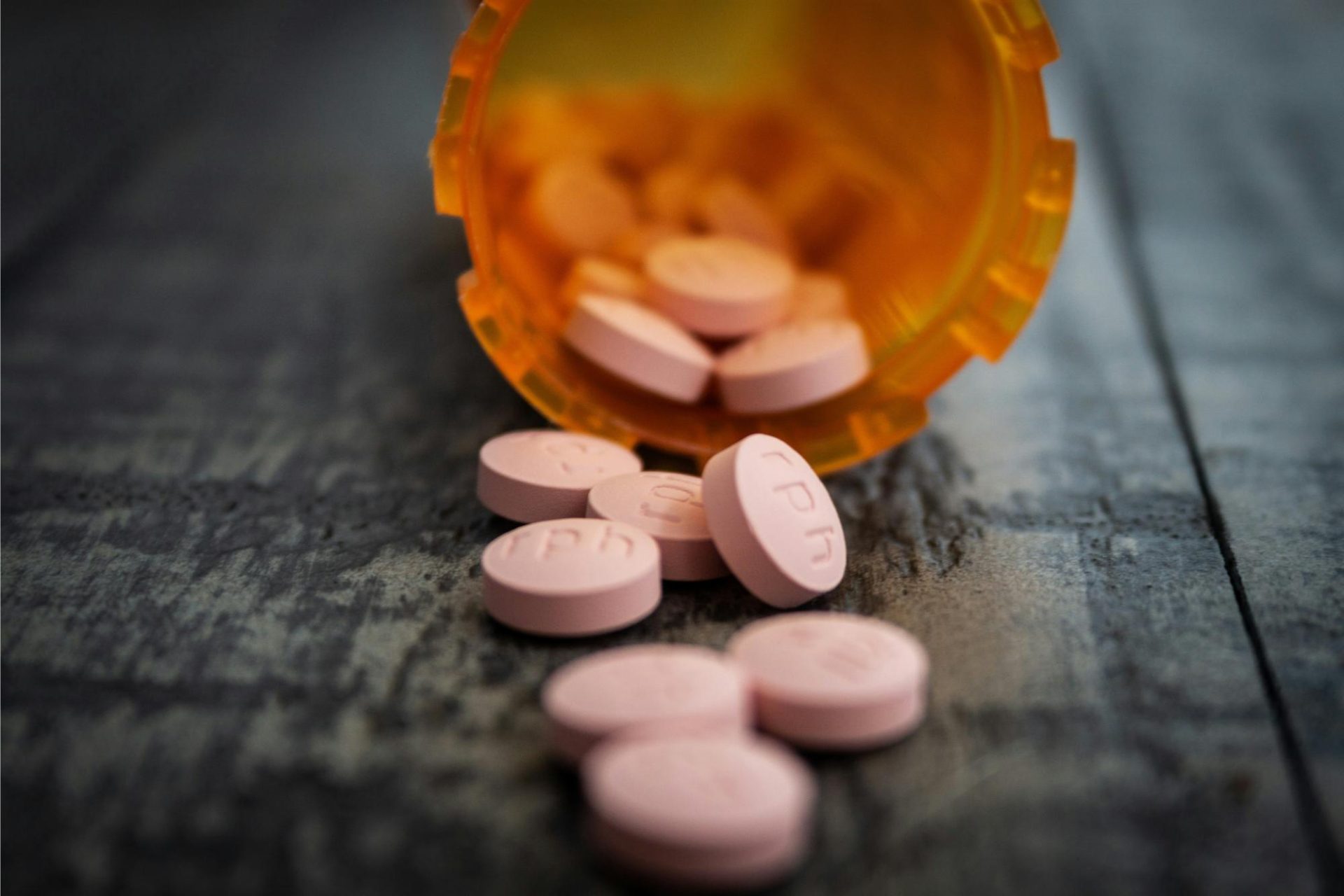 Pills spilling from bottle